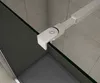 A close-up view of a shower enclosure's metal support arm attached to a glass panel, with tiled walls and a shower tray visible in the background. Produktbild-Vorschau