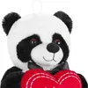 Close-up of a stuffed panda bear holding a red heart. Produktbild-Vorschau