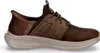 A side view of a brown Skechers Slip-Ins shoe against a white background. Voir les images du produit