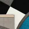 A close-up view of a rug, showing the texture and pattern of the material. The underside of the rug is also visible. Anteprima dell’immagine prodotto