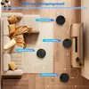 A living room scene with a sectional sofa, a rug, and a TV stand, showcasing different cleaning modes of a robot vacuum cleaner. Produktbild-Vorschau