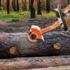 A close-up view of a chainsaw attachment being used to debark a log in a forest setting. Náhled obrázku produktu