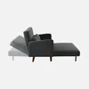 A dark gray sofa bed with a corduroy cover and wooden legs is shown in profile, with the bed portion extended. Produktbild-Vorschau