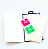 A screen protector kit for a phone, including cleaning wipes and the protector itself, laid out on a white background. Podgląd zdjęcia produktu
