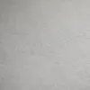 A close-up, textured view of a gray surface. Produktbild-Vorschau