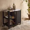 An outdoor kitchen cart with food preparation items on a stone patio. Produktbild-Vorschau
