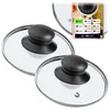 A collage showing two glass lids with black handles and a marketing graphic with size options. Voir les images du produit