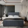 A bedroom scene featuring a large bed. Produktbild-Vorschau