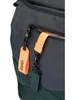 A close-up view of the zippers and tags on a dark gray backpack. Produktbild-Vorschau