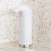 A white soap dispenser with a silver base sits on a speckled countertop, with a matching speckled wall behind it. Anteprima dell’immagine prodotto