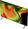 A television screen displaying a colorful abstract image, with its stand visible. Produktbild-Vorschau