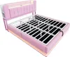 A pink upholstered bed frame with a metal mattress support system is shown against a white background. The bed has a tufted headboard with integrated lighting and side shelves. The frame also features LED lighting along the bottom. Produktbild-Vorschau