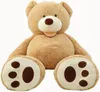 A large, plush teddy bear sitting on a white background. Anteprima dell’immagine prodotto