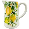 A white ceramic pitcher decorated with a lemon and leaf pattern. Produktbild-Vorschau