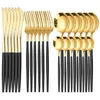 A set of gold and black cutlery arranged neatly on a white background. Podgląd zdjęcia produktu