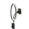 A ring light with a phone holder attached, isolated on a white background. Produktbild-Vorschau