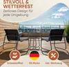 A balcony setting with outdoor furniture and a cityscape in the background. Anteprima dell’immagine prodotto
