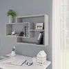A modern, grey floating shelf unit mounted on a light grey wall above a white desk. Produktbild-Vorschau