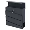 A dark gray metal mailbox with a key in the lock and a newspaper holder. Produktbild-Vorschau