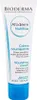 A white tube of Bioderma Atoderm Nutritive cream with blue accents and text. Podgląd zdjęcia produktu