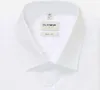 A close-up view of a white men's dress shirt collar and label. Produktbild-Vorschau
