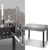 A split image showing a welding table with clamps and metal pieces on the left, and a smaller welding table on the right. Náhľad obrázku produktu