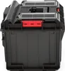 A black tool box with red latches and clear compartments on top, shown from the front. Náhled obrázku produktu