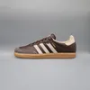 A single Adidas Samba OG shoe is shown in profile against a plain gray background. Podgląd zdjęcia produktu