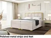 A bedroom scene featuring a large bed with a headboard, bedside tables, and curtains. Produktbild-Vorschau