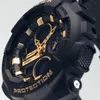 A close-up shot of a black and gold Casio G-Shock watch. Voir les images du produit