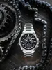 A silver Casio Edifice watch is placed on a wooden surface surrounded by a metal chain and a gear. Produktbild-Vorschau
