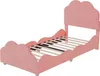 A pink children's bed with a cloud-shaped headboard and footboard, shown from a side angle against a white background. Voir les images du produit