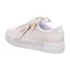 A side view of a beige Rieker women's platform sneaker with a gold zipper. Náhled obrázku produktu