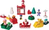 A collection of small Christmas-themed toys, likely from an advent calendar, featuring Paw Patrol characters and festive elements. Podgląd zdjęcia produktu