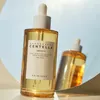 A bottle of Skin1004 Madagascar Centella Ampoule is shown in front of a reflective surface, with a second bottle visible in the reflection. Anteprima dell’immagine prodotto
