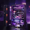 A futuristic computer case with internal components illuminated by purple LEDs, set against a blurred cityscape background. Voir les images du produit