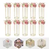 Ten gold flower stands with pink and green floral arrangements are displayed against a white background. Below are three smaller hexagonal images showing the flower stands in different settings. Podgląd zdjęcia produktu