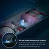A drawer with baby items, illuminated by a small night light. Voir les images du produit