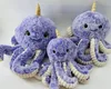 Three purple octopus plush toys with horns on a white and light gray background. Produktbild-Vorschau