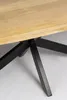 A close-up view of the base of a wooden table with a black metal frame. Voir les images du produit