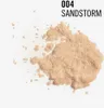 A pile of loose powder makeup on a white background with text labels. Náhled obrázku produktu