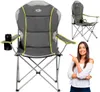 A woman points to a camping chair, with another camping chair shown in the background. Produktbild-Vorschau