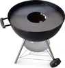 A black kettle grill with a circular metal insert on top. Náhled obrázku produktu