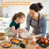 A mother and daughter are baking in a kitchen, surrounded by various baking accessories and finished baked goods. Produktbild-Vorschau