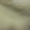 A close-up view of a soft, plush material. Produktbild-Vorschau