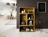 A room with a wooden crate shelf unit filled with decorative items and books, a bed, and a floor lamp. Produktbild-Vorschau
