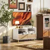 Meuble TV HOMCOM de 99 cm de long avec 2 étagères et un Voir les images du produit 2