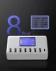 A white USB charging station with multiple ports, displayed on a dark background with graphic overlays. Produktbild-Vorschau