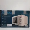 The image shows the packaging of a Cecotec Proclean 3110 Retro microwave in beige. Produktbild-Vorschau