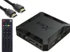 A black multimedia player, remote control, and two HDMI cables are arranged on a white background. Náhľad obrázku produktu